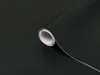 A roll of black adhesive film is shown on a black surface. Náhľad obrázku produktu