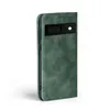 A green flip case for a Google Pixel 8 phone is shown against a white background. Produktbild-Vorschau