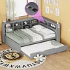 A grey corner daybed with a pull-out trundle bed, set in a child's bedroom with decorative wall art and a lion-themed rug. Voir les images du produit