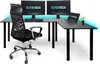 A black L-shaped desk with two monitors, a laptop, a keyboard, a mouse, and a black ergonomic chair, with blue LED lighting in the background. Produktbild-Vorschau