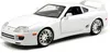 A white Jada Toys 1:24 Fast & Furious Brian's 1995 Toyota Supra model car is shown from a three-quarter front angle against a white background. Produktbild-Vorschau