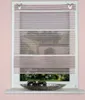 A window with blinds and decorative balls on the windowsill. Produktbild-Vorschau