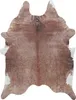 A cowhide rug is displayed flat against a white background. Náhled obrázku produktu