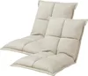 Two beige floor chairs are shown against a white background. Voir les images du produit