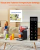 A woman is sitting on a couch reading a book while a frozen drink maker is on a coffee table in front of her. There are drinks on the table and a remote control next to the machine. Produktbild-Vorschau