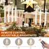 A table setting with LED candles and festive decorations. Produktbild-Vorschau