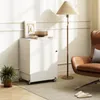A white sewing table with a lamp and chair in a room. Náhľad obrázku produktu