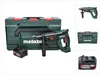 A Metabo cordless rotary hammer drill with its case and battery pack, presented on a white background. Podgląd zdjęcia produktu