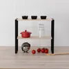 A two-tier shelf unit with kitchen items on a countertop. Anteprima dell’immagine prodotto