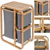 A multi-panel image showcasing a bamboo laundry basket with three grey fabric bags. Produktbild-Vorschau