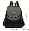 A black leather backpack with dimensions shown. Podgląd zdjęcia produktu