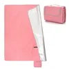 A pink picnic blanket is shown unfolded and folded. Podgląd zdjęcia produktu