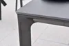 A close-up of the corner of a dark gray table with a stone-look tabletop. Produktbild-Vorschau