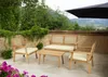 A wooden outdoor furniture set with cushions is arranged on a patio with a scenic mountain view in the background. Podgląd zdjęcia produktu