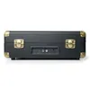 The back view of a black record player stereo system with gold accents and connectors. Voir les images du produit