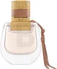 A close-up studio shot of a Chloé Nomade Eau de Toilette bottle. Anteprima dell’immagine prodotto