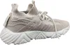 A side view of a beige sneaker with a white sole against a white background. Produktbild-Vorschau