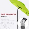 A close-up of a green umbrella with text overlays highlighting its features. Produktbild-Vorschau