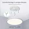 A ceiling light fixture being installed, showing the mounting bracket and wiring. Produktbild-Vorschau