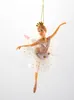 A decorative ballerina ornament hanging against a white background. Produktbild-Vorschau