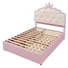 A pink bed frame with a tufted headboard and a crown design. Anteprima dell’immagine prodotto