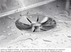Close-up of a sink drain with water droplets. Produktbild-Vorschau
