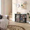 A living room setting with a shoe rack, sofa, and rug. Produktbild-Vorschau