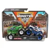 Two Monster Jam monster trucks in their packaging, with a stadium background. Voir les images du produit