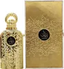 A gold-colored perfume bottle and its matching box are displayed against a white background. Podgląd zdjęcia produktu