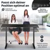 Two women are shown at a height-adjustable desk, one sitting and one standing, to demonstrate its versatility. Produktbild-Vorschau