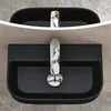 A top-down view of a black ceramic sink with a chrome faucet. Produktbild-Vorschau