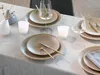 A table setting with plates, glasses, cutlery, and candles. Náhľad obrázku produktu