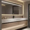 A modern bathroom vanity with a sink, faucet, and mirror. Produktbild-Vorschau