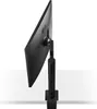 Side view of a black LG monitor mounted on a stand, clamped to a white surface. Produktbild-Vorschau