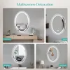 A collage of four images showing an oval LED mirror in different room settings. Náhľad obrázku produktu