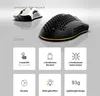 Two gaming mice are displayed, one white and one black, with feature callouts below. Náhled obrázku produktu