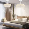 A bedroom with a bed, curtains, and two ceiling fans with lights. Voir les images du produit