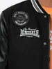 Close-up of a black college jacket with Lonsdale branding. Produktbild-Vorschau