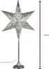 A silver star-shaped lamp on a stand. Produktbild-Vorschau
