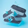 A stack of clear plastic food containers with dark gray lids, decorated with origami paper cranes. Náhľad obrázku produktu