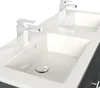 A close-up view of a double vanity sink with chrome faucets. Produktbild-Vorschau