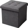 A dark gray fabric storage ottoman with a tufted lid is shown against a white background. Náhľad obrázku produktu
