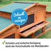 A wooden rabbit hutch with a green roof, shown outdoors on grass. Produktbild-Vorschau