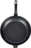 A top-down view of a black frying pan with a speckled interior and a black handle, isolated on a white background. Anteprima dell’immagine prodotto