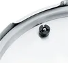 A close-up view of a pressure cooker lid with a safety valve. Náhled obrázku produktu