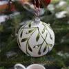 Sklenená banka v bielom porceláne s dekorom imela Náhľad obrázku produktu 3