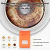 A close-up of a self-stirring mug with various beverage icons and operational instructions. Podgląd zdjęcia produktu