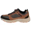 A side view of a brown Skechers walking shoe against a white background. Produktbild-Vorschau