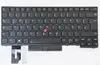 A black keyboard with a red trackpoint, shown from a top-down perspective against a white background. Cables are attached to the bottom left. Produktbild-Vorschau
