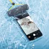 A waterproof phone pouch with a phone inside is submerged in water. Anteprima dell’immagine prodotto